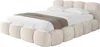 A bed with a headboard and frame, shown from a diagonal angle. Produktbild-Vorschau