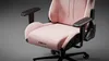A pink gaming chair is shown against a gray background. Náhľad obrázku produktu