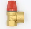 A close-up studio shot of a brass safety valve with a red cap. Anteprima dell’immagine prodotto