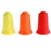 Three silicone suction cups in different colors are arranged in a line against a white background. Produktbild-Vorschau