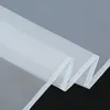 A close-up, folded view of white sheer fabric, likely a curtain or sheer textile, against a dark background. Produktbild-Vorschau