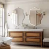 A luxurious bathroom vanity with two mirrors, a bathtub, and a stool. Anteprima dell’immagine prodotto
