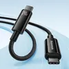 A black USB-C charging and data cable is coiled on a light blue and white background. Náhľad obrázku produktu