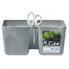 A gray planter with a marbled texture, featuring a pair of white scissors attached to the side. A label with an image of herbs and the product name is on the right side. Náhled obrázku produktu
