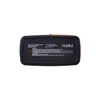 The top view of a black and orange jump starter power bank with labels and certifications visible. Náhled obrázku produktu