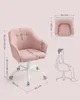 A pink office chair with dimensions and a diagram of a person sitting in it. Náhled obrázku produktu