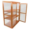 A wooden greenhouse with clear plastic panels and shelves, shown against a white background. Produktbild-Vorschau