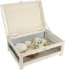 A wooden cheese cellar with various cheeses inside, displayed on a white background. Voir les images du produit