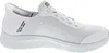 A white Skechers slip-on sneaker is shown from the side against a white background. Voir les images du produit