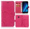A collage of images showing a pink flower-look bookstyle phone case for a Samsung Galaxy J4 Plus. Produktbild-Vorschau