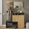 An entryway with a mirror, coat rack, and shoe bench. Náhľad obrázku produktu