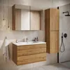 A modern bathroom vanity set with a sink, cabinet, and a tall storage unit, set against a tiled wall. Anteprima dell’immagine prodotto