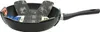A black wok pan with informational tags and inserts inside. Produktbild-Vorschau