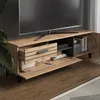 A TV stand with drawers and cabinets, with a TV on top and some books and a DVD player inside. Podgląd zdjęcia produktu