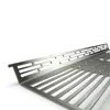 A close-up, angled view of a metal grill rack with a patterned cutout design, set against a white background. Podgląd zdjęcia produktu