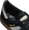 Close-up view of the inside and side of a black Adidas sneaker. Podgląd zdjęcia produktu