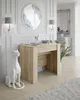 A modern entryway or living space with a console table, decorative items, and a statue. Produktbild-Vorschau