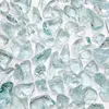 Transparente helltürkise Glassteine dicht aneinander liegend im Detail Produktbild-Vorschau