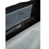 Close-up view of the interior of a bag, showing mesh pockets and lining. Produktbild-Vorschau
