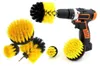 A set of drill brush attachments and a cordless drill. Voir les images du produit