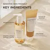 A close-up shot of two skincare products with text overlays highlighting key ingredients. Voir les images du produit