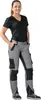 A woman is standing and posing in work pants. Produktbild-Vorschau