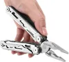 A hand holding a multitool. Náhľad obrázku produktu