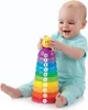 A baby is playing with a stacking toy. Produktbild-Vorschau