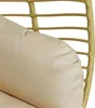 A close-up view of a beige cushion on a rattan chair. Produktbild-Vorschau