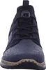 A front view of a blue sneaker with a patterned design. Voir les images du produit