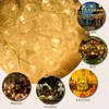A collage of images showing different uses of warm white crystal ball string lights, including street decoration, garden gazebo, indoor house decoration, terrace lighting, and a Christmas tree. Náhled obrázku produktu