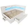 A white bed frame with integrated storage and LED lighting. Produktbild-Vorschau