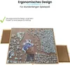 A puzzle board with a partially completed puzzle and drawers extended. Produktbild-Vorschau