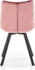 The back view of a pink velvet chair with black metal legs. Náhled obrázku produktu