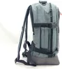 A side view of a gray backpack against a white background. Produktbild-Vorschau