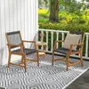 Two outdoor chairs on a patio with a rug and a small table. Produktbild-Vorschau