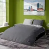A bedroom scene with a bed, a window, and a painting on the wall. Produktbild-Vorschau