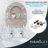 A toilet seat with a 'HOME' design is shown being mounted onto a toilet bowl, with a close-up of the mounting hardware and tools. Produktbild-Vorschau