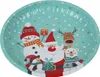 A round metal plate with a festive Christmas design featuring Santa Claus, a snowman, a reindeer, a penguin, and a polar bear, set against a light teal background with white snowflakes and stars. Produktbild-Vorschau