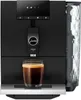A black Jura ENA 4 espresso machine with a glass of coffee in the foreground. Anteprima dell’immagine prodotto