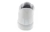 The back view of a white Puma sneaker with a gold Puma logo on a white background. Podgląd zdjęcia produktu