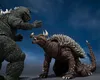 Two monster action figures, Godzilla and Anguirus, are posed in a confrontational stance against a blue background. Náhled obrázku produktu