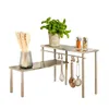 A kitchen corner shelf with utensils, a plant, and spice shakers. Produktbild-Vorschau