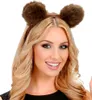 A woman wearing bear ears headband. Produktbild-Vorschau
