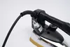 Close-up of an industrial steam iron with a black power cord attached. Podgląd zdjęcia produktu