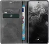 A phone case with a phone inside, showing the lock screen and some cards and a banknote in the case. Produktbild-Vorschau