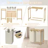 An instructional diagram showing the assembly steps for a laundry basket. Voir les images du produit
