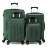 Four dark green suitcases of varying sizes are arranged in a group against a white background. Anteprima dell’immagine prodotto