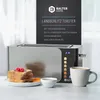 A Balter Home long slot toaster is displayed with toast, jam, raspberries, and a cup of coffee, alongside marketing text. Produktbild-Vorschau