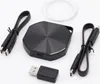 A black external SSD and its accessories are laid out on a white background. Náhled obrázku produktu